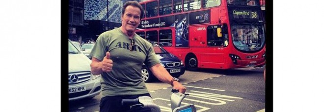 Arnold Schwarzenegger on bicycle